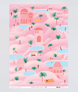 desert oasis pink luxury wrapping paper shows tranquil pools and palm trees with sunbathers perfect for a unique gift at Crane and Kind 
