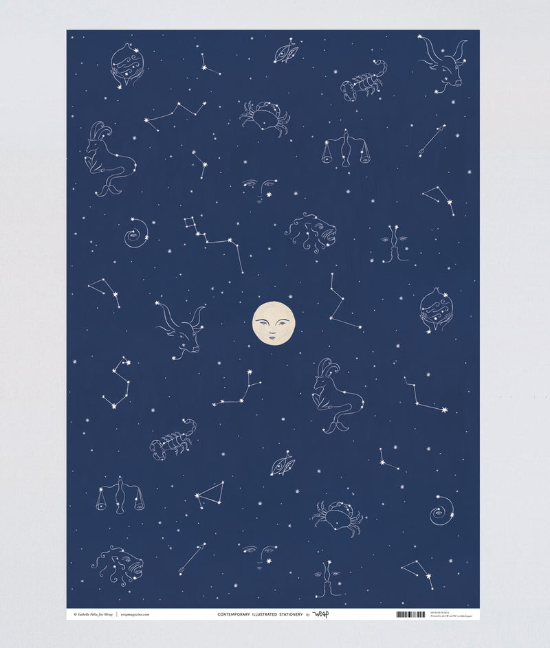 constellations on a dark blue background with stars and a stylish moon on this luxury wrapping paper at Crane and Kind for unique gifts